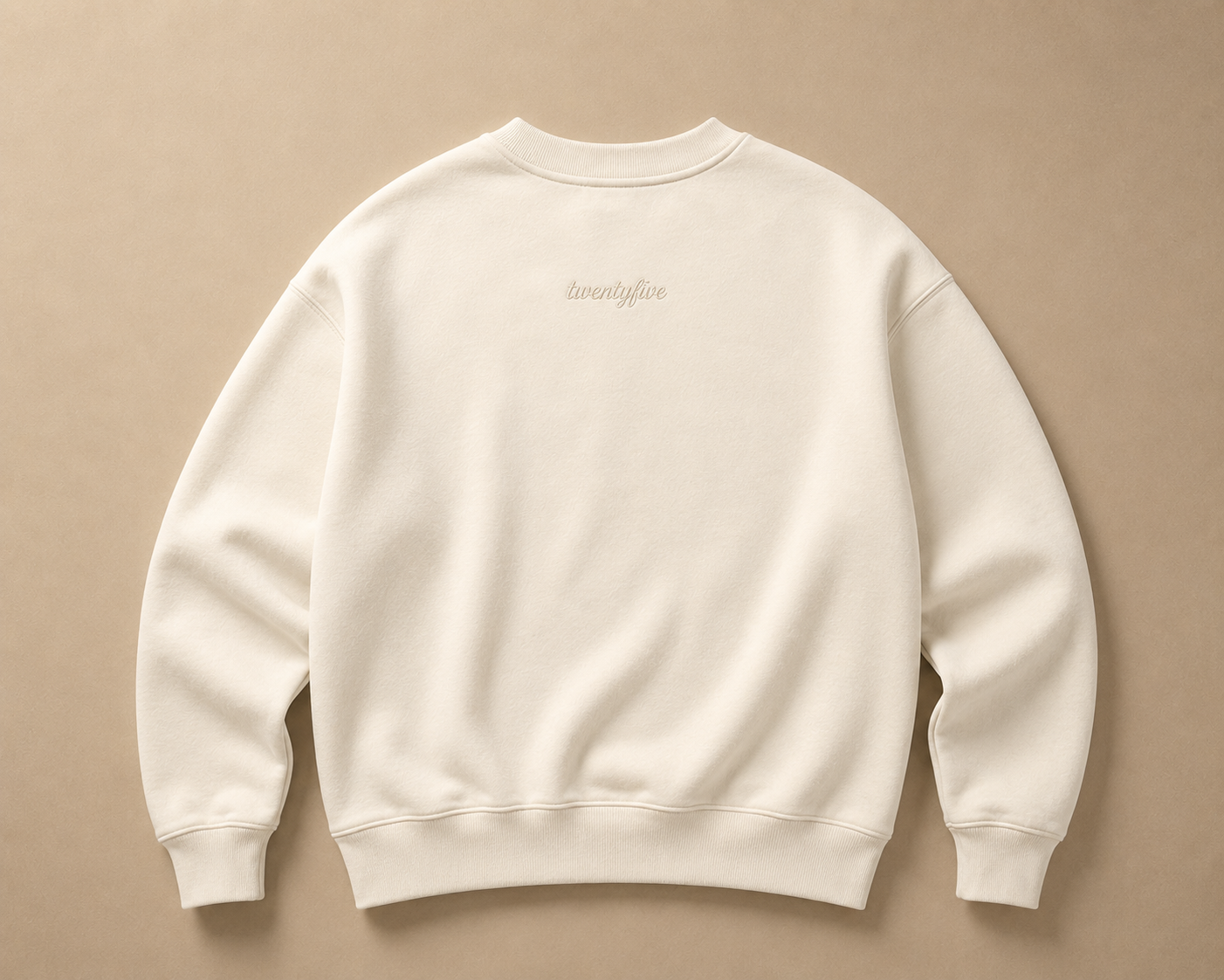 cream sweatshirt with 'twentyfive' in script on the back